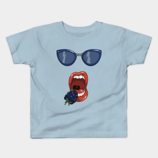 Mouth about to eat a blueberry while wearing matching blue sun glasses. Kids T-Shirt
